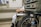 a woman sitting in a wheel chair in a hospital