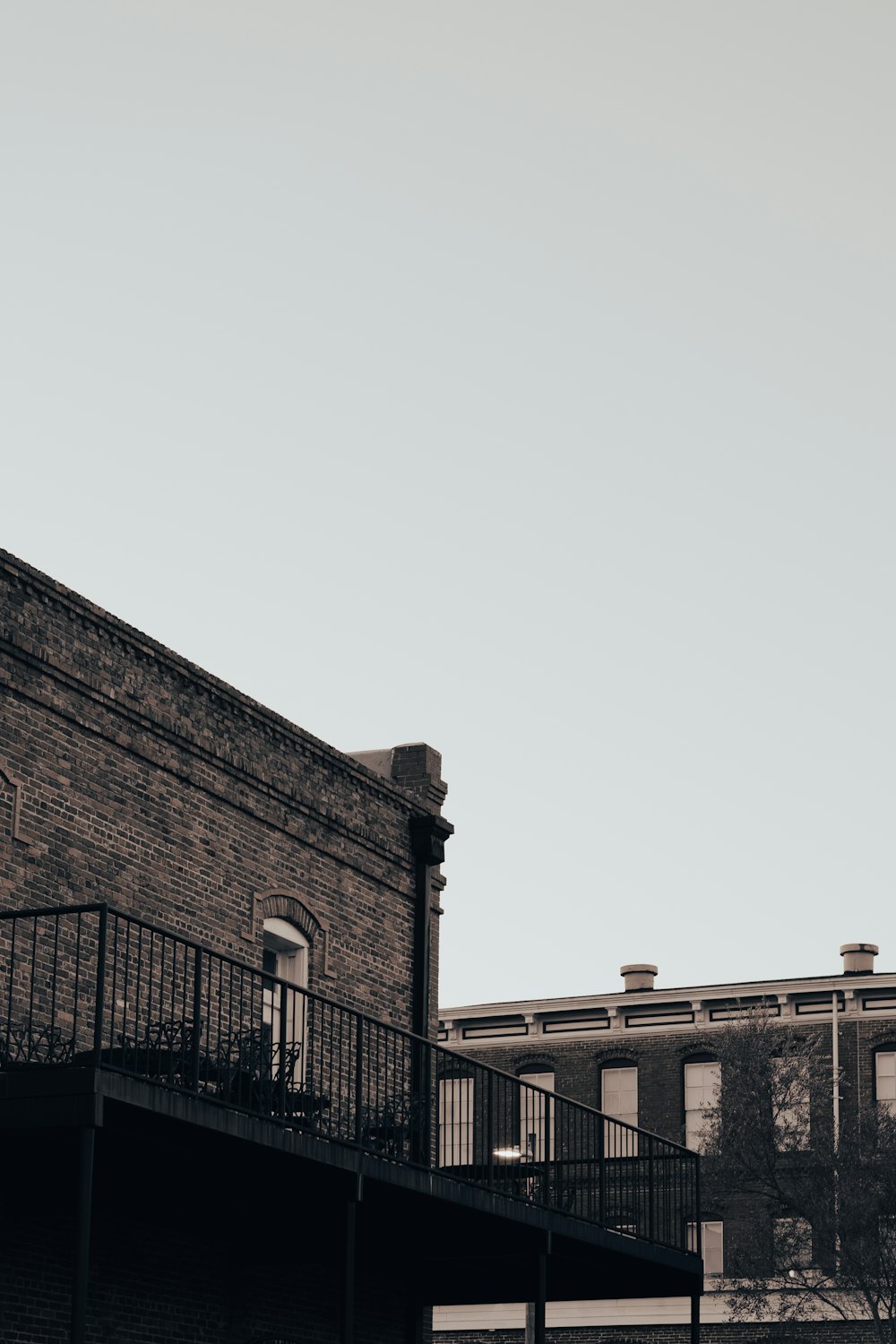 a black and white photo of a clock tower