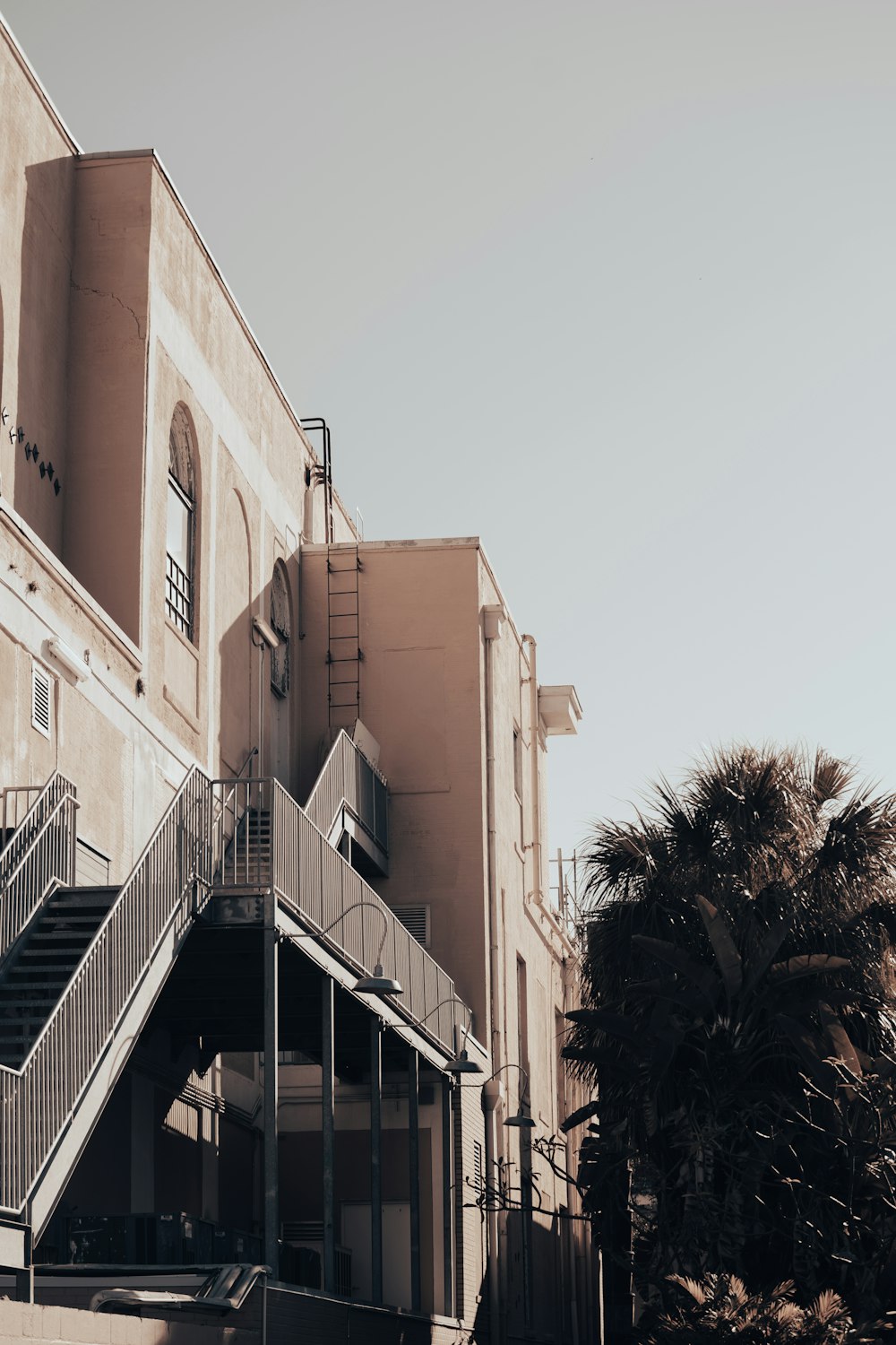 a building with a staircase going up the side of it