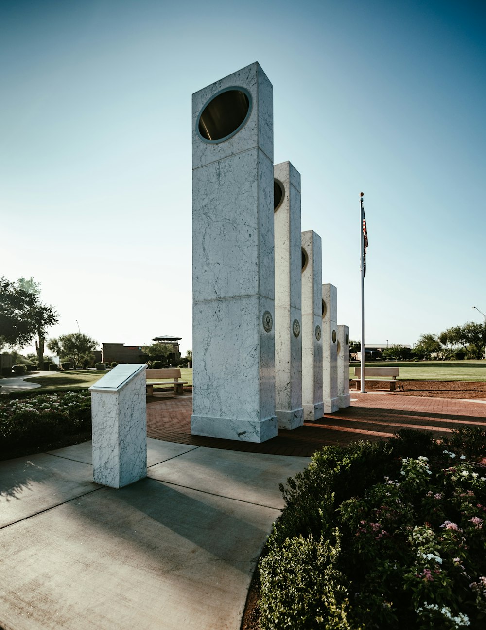 a monument with a clock on the top of it