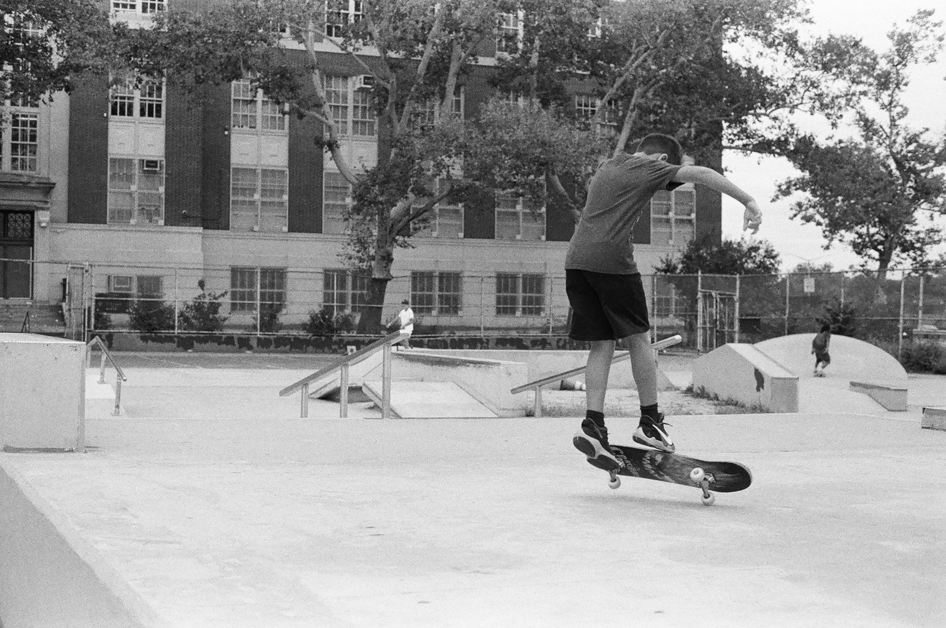 a man riding a skateboard down the side of a ramp