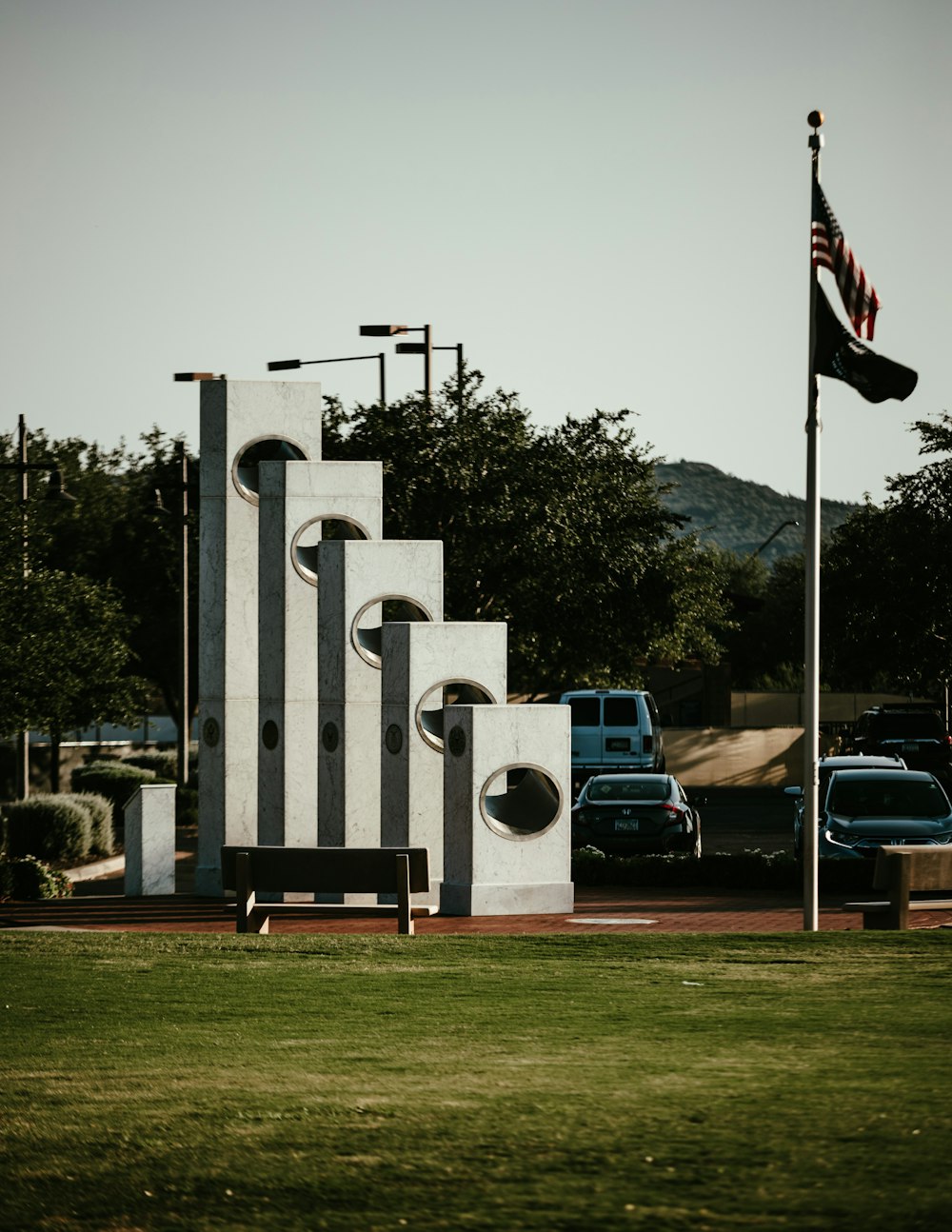 a monument with a flag on top of it
