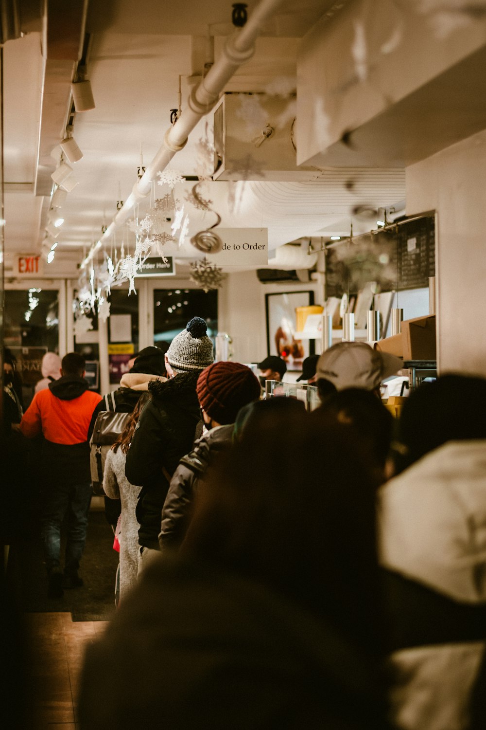 a group of people standing in a room