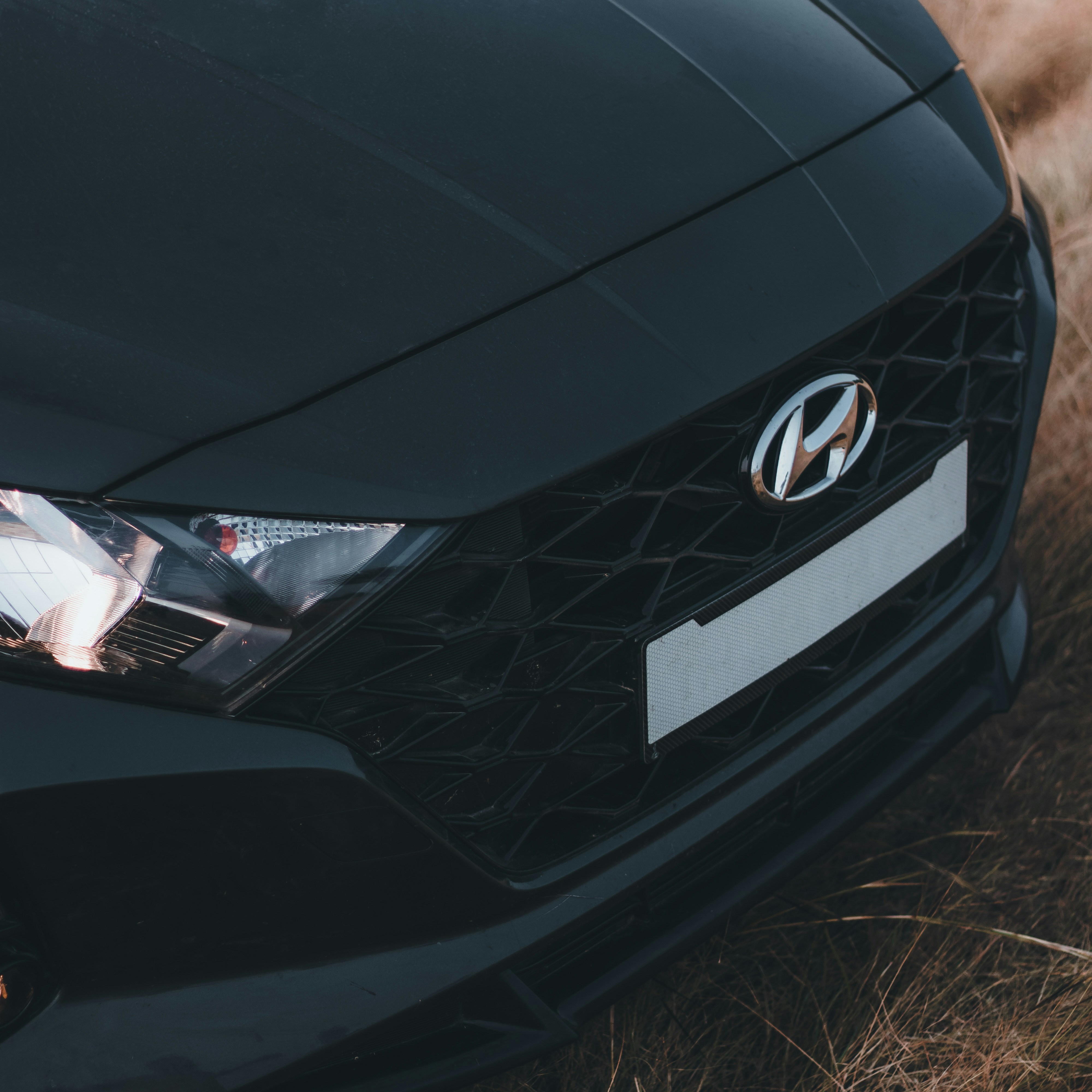 a close up of the front of a black car