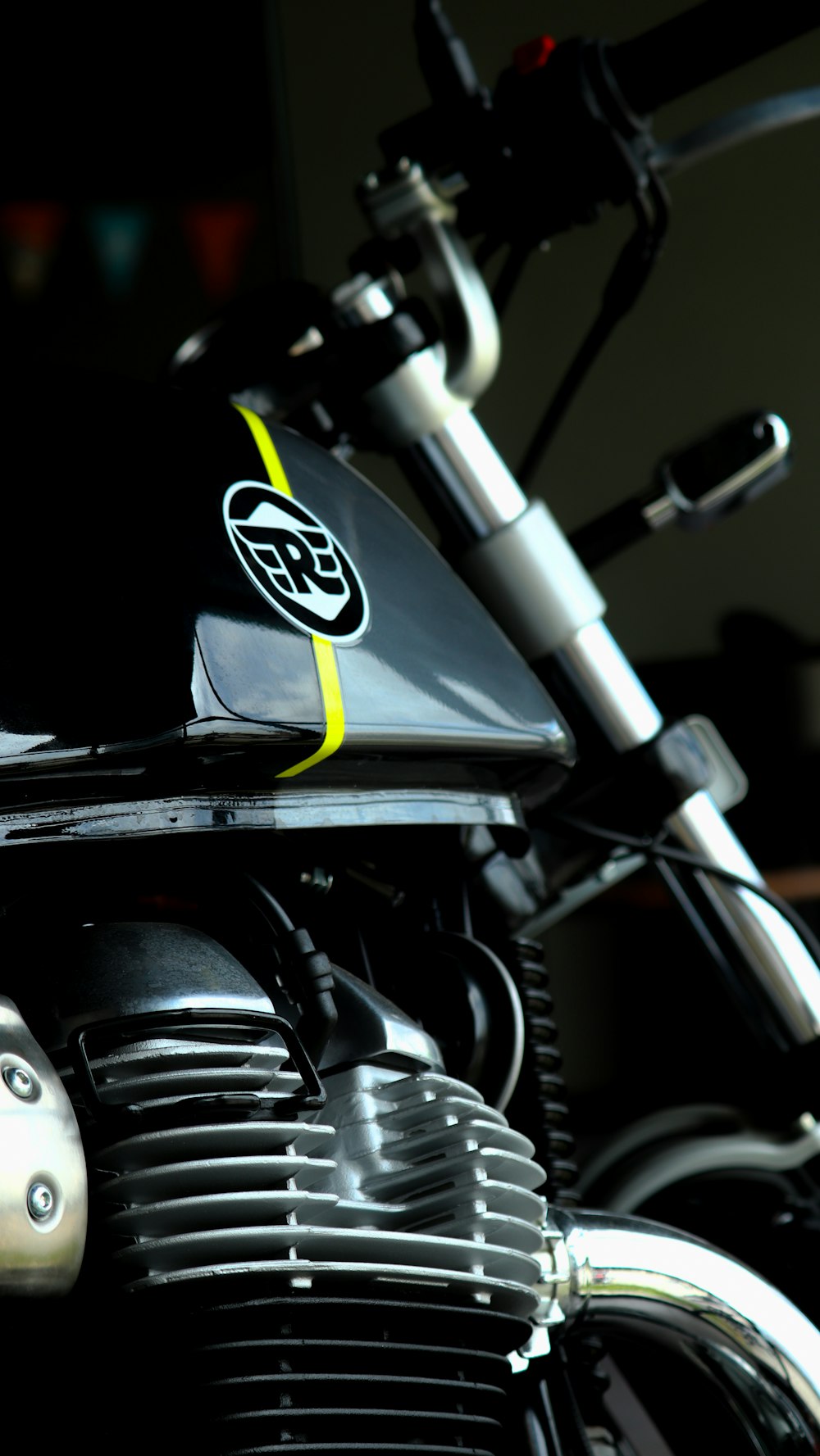 a close up of a motorcycle parked in a room