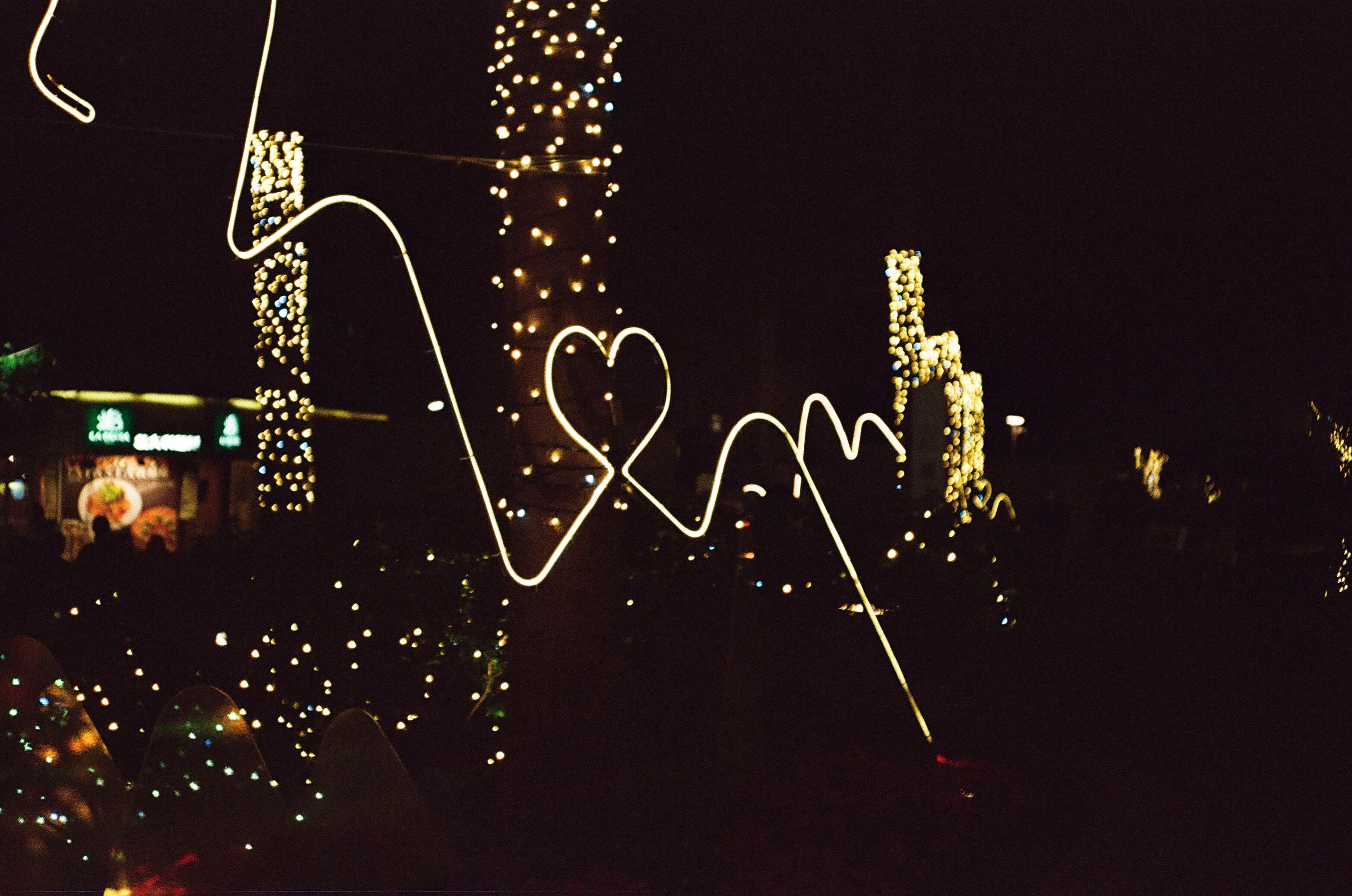 a picture of a city at night with lights