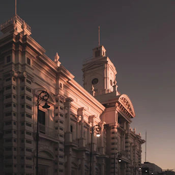 a large building with a clock on the top of it