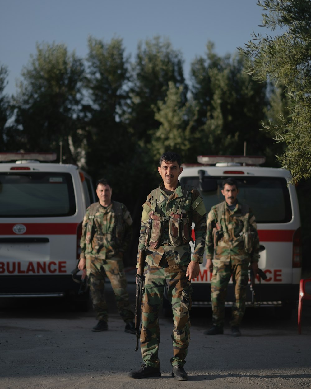 a group of soldiers walking down a street