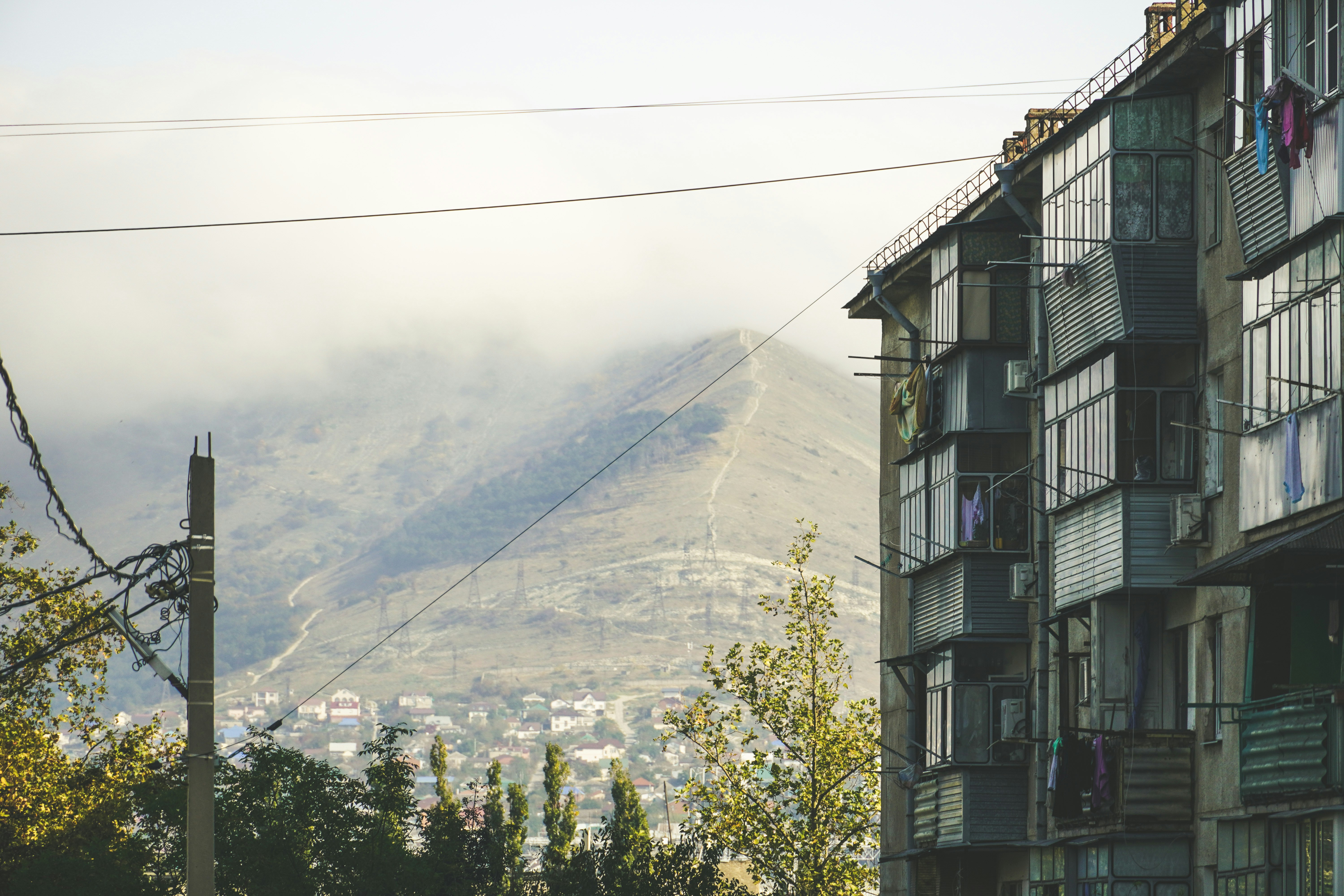a view of a city with a mountain in the background