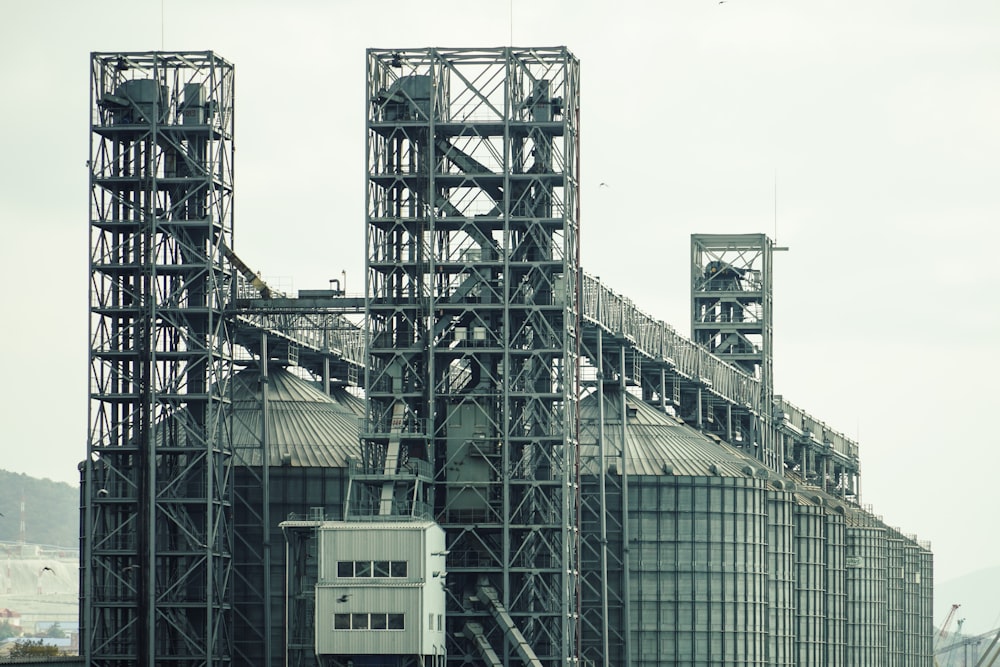 a large industrial building with a lot of pipes