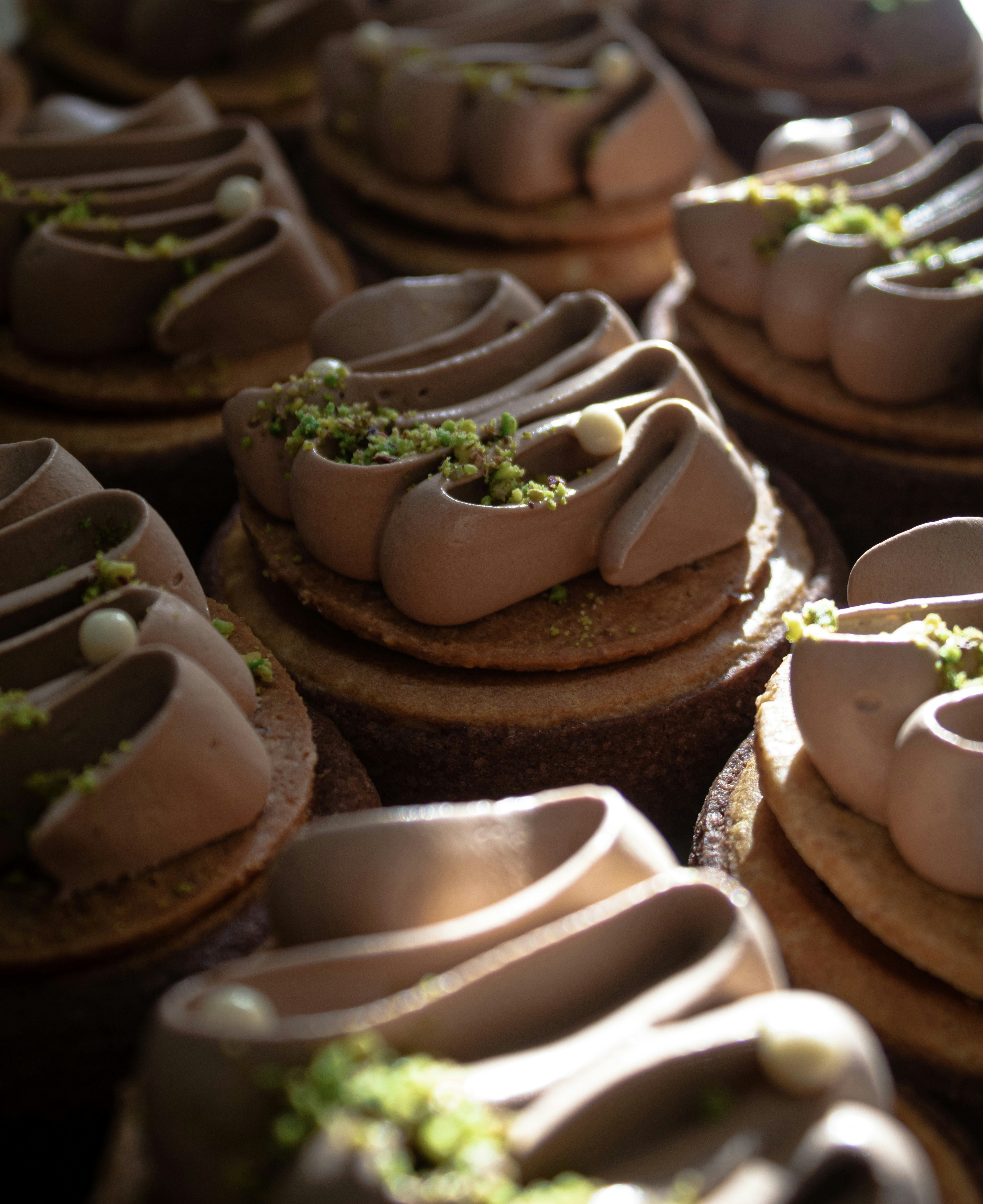 a close up of a tray of cupcakes