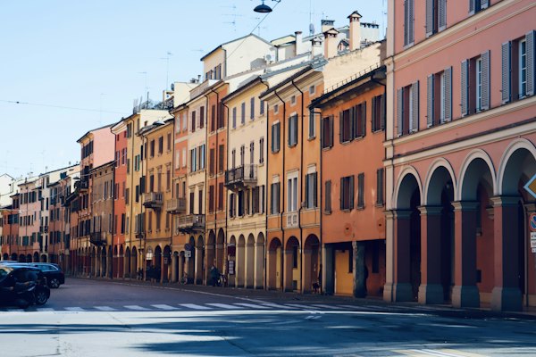 A row of buildings on a city street — Bologna, Italy