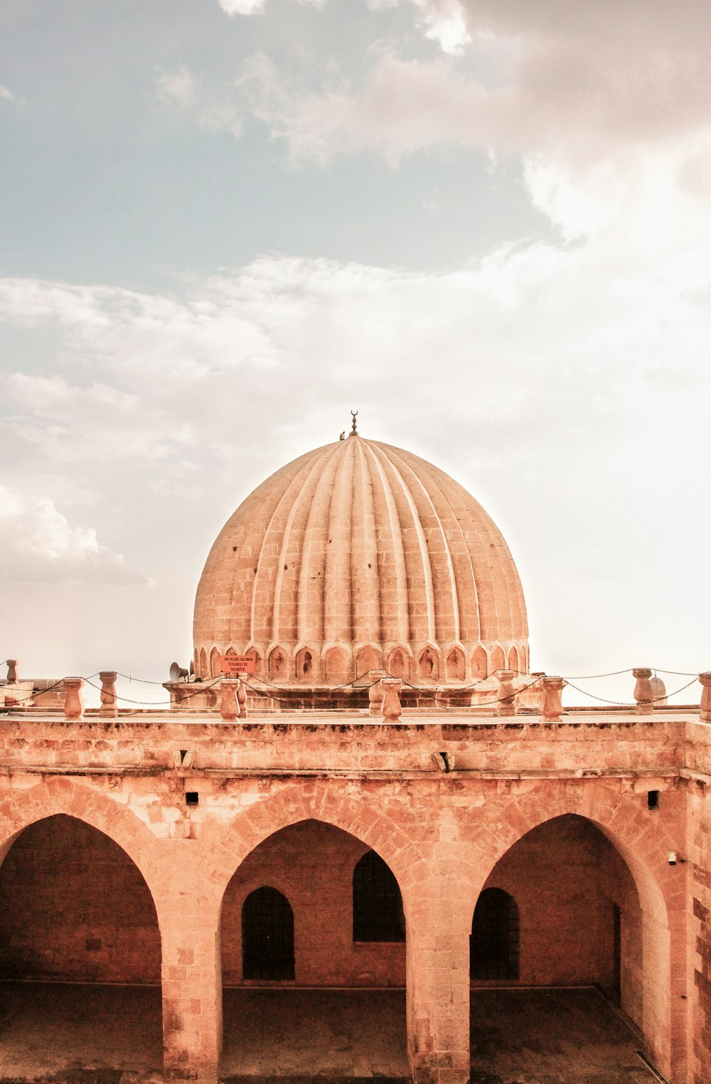 a large building with a dome on top of it