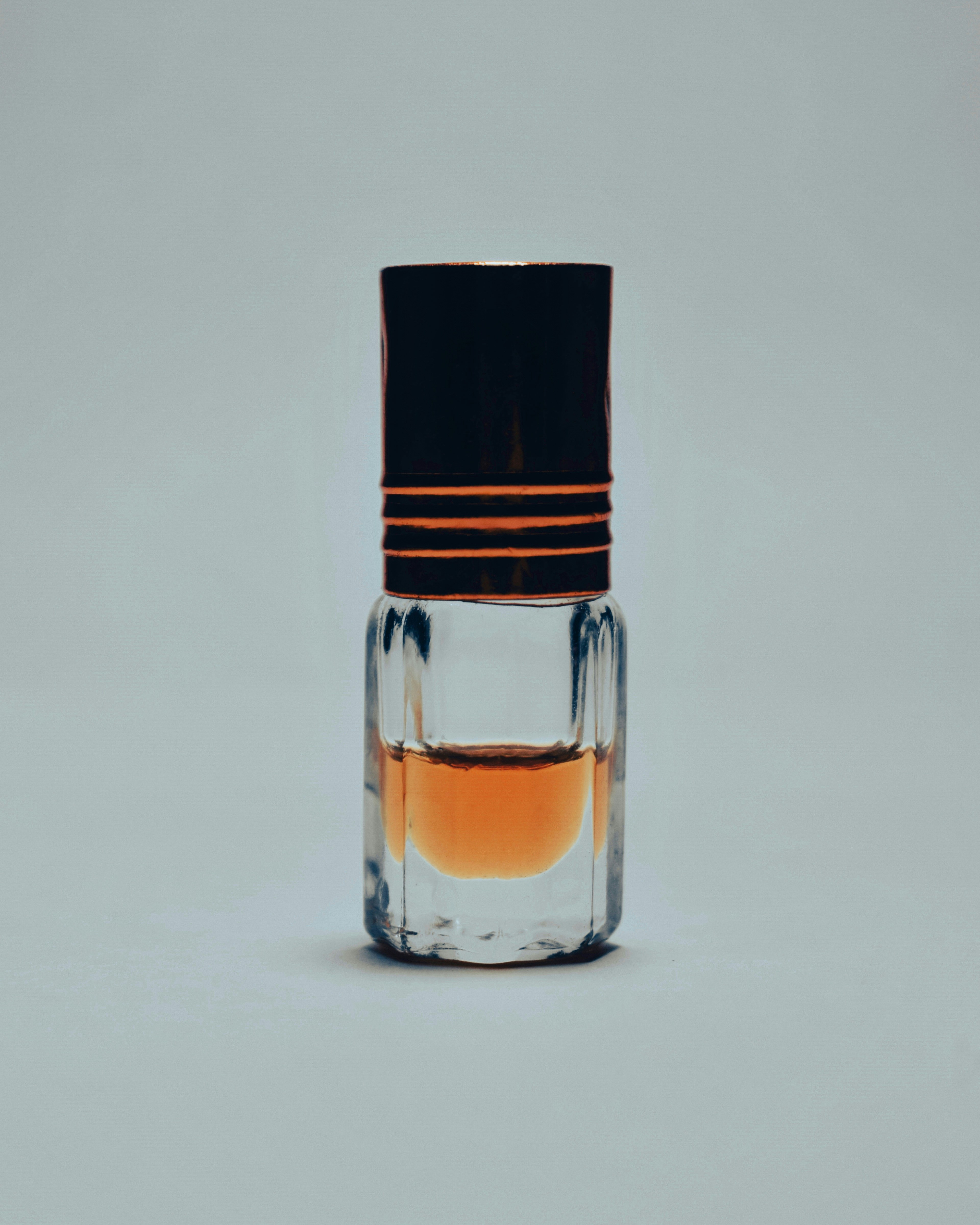 a glass bottle with a liquid inside of it