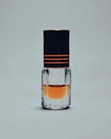 a glass bottle with a liquid inside of it