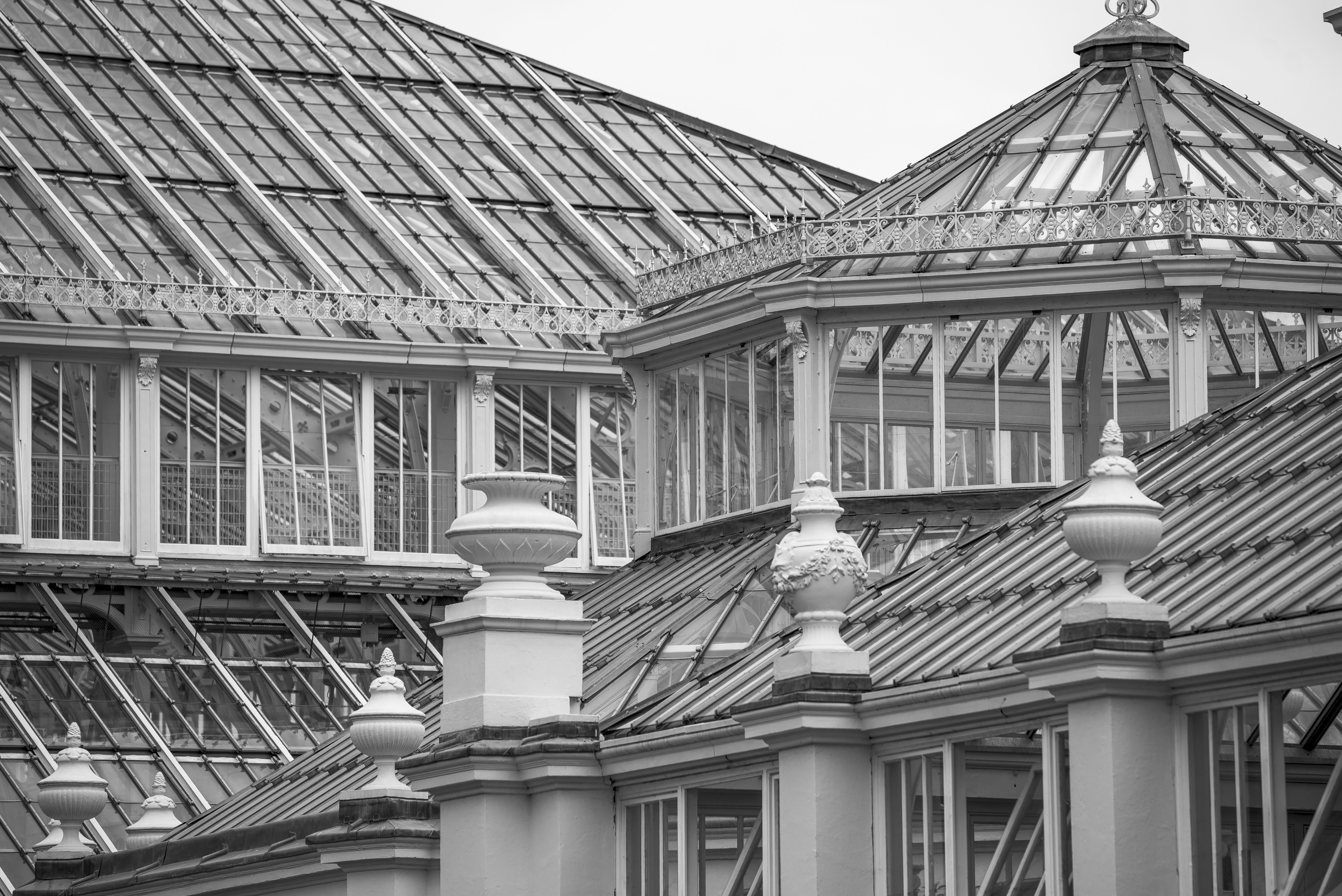 a black and white photo of a building with many windows
