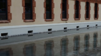 Commercial building facade treated with waterproofing coating