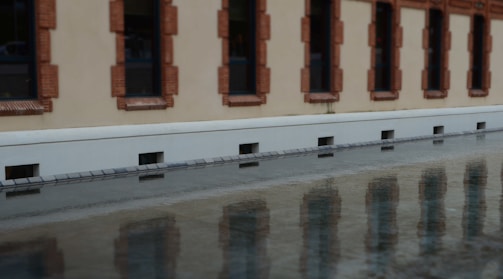 Commercial building facade treated with waterproofing coating