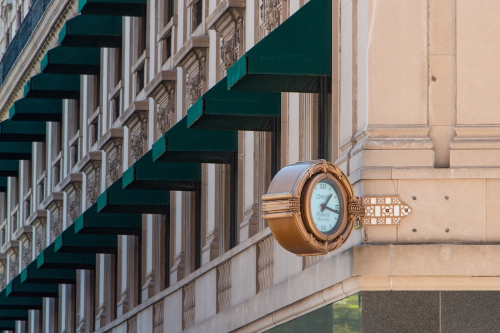 a clock on the side of a building