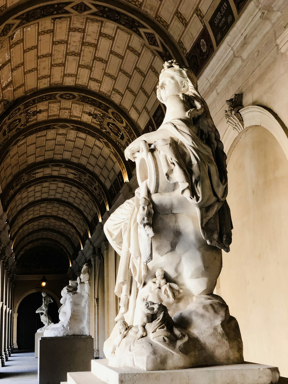 a statue of a woman in a building