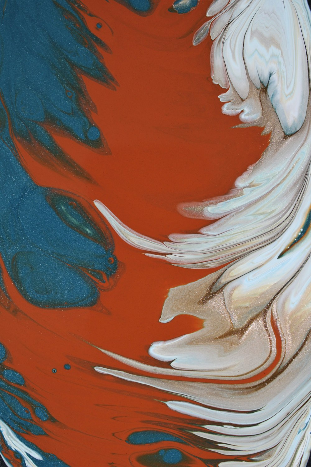 an abstract painting of red, white, and blue