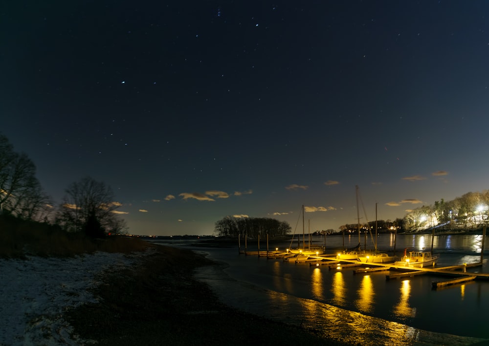 a body of water with a bunch of lights on it