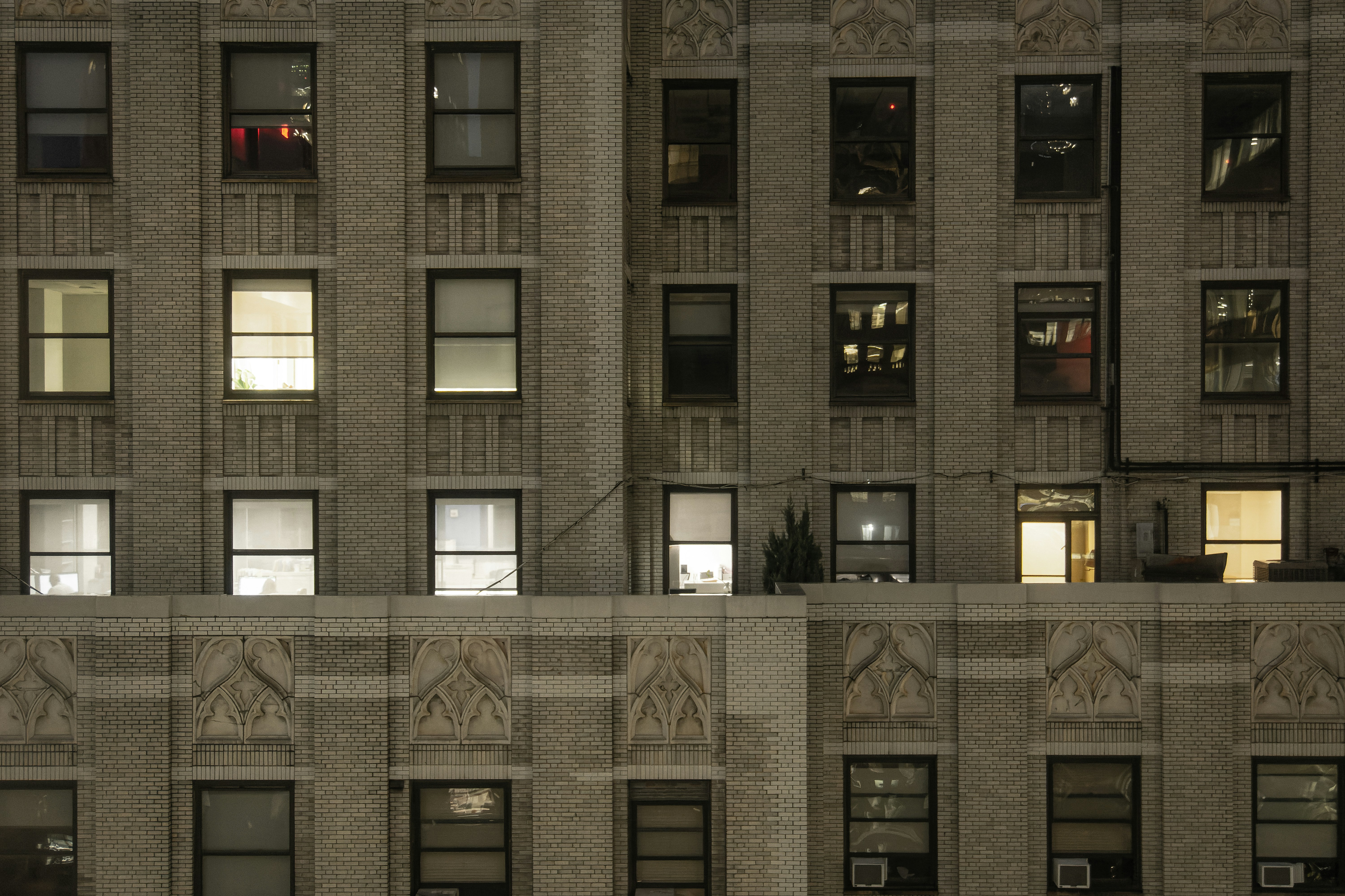 a very tall building with lots of windows, 