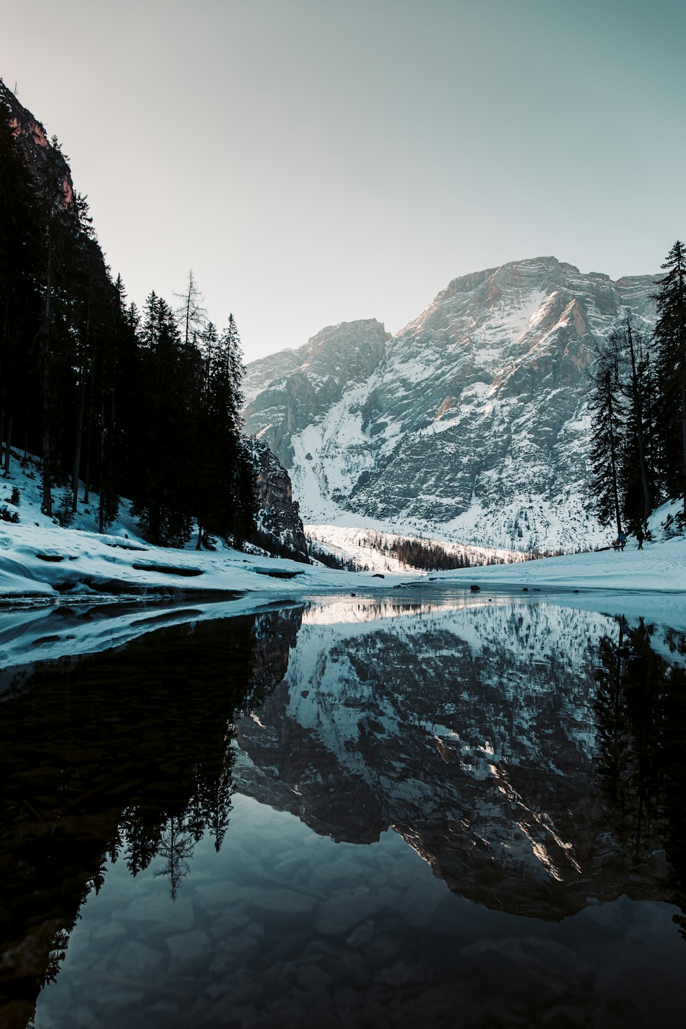 a mountain with a lake in the middle of it