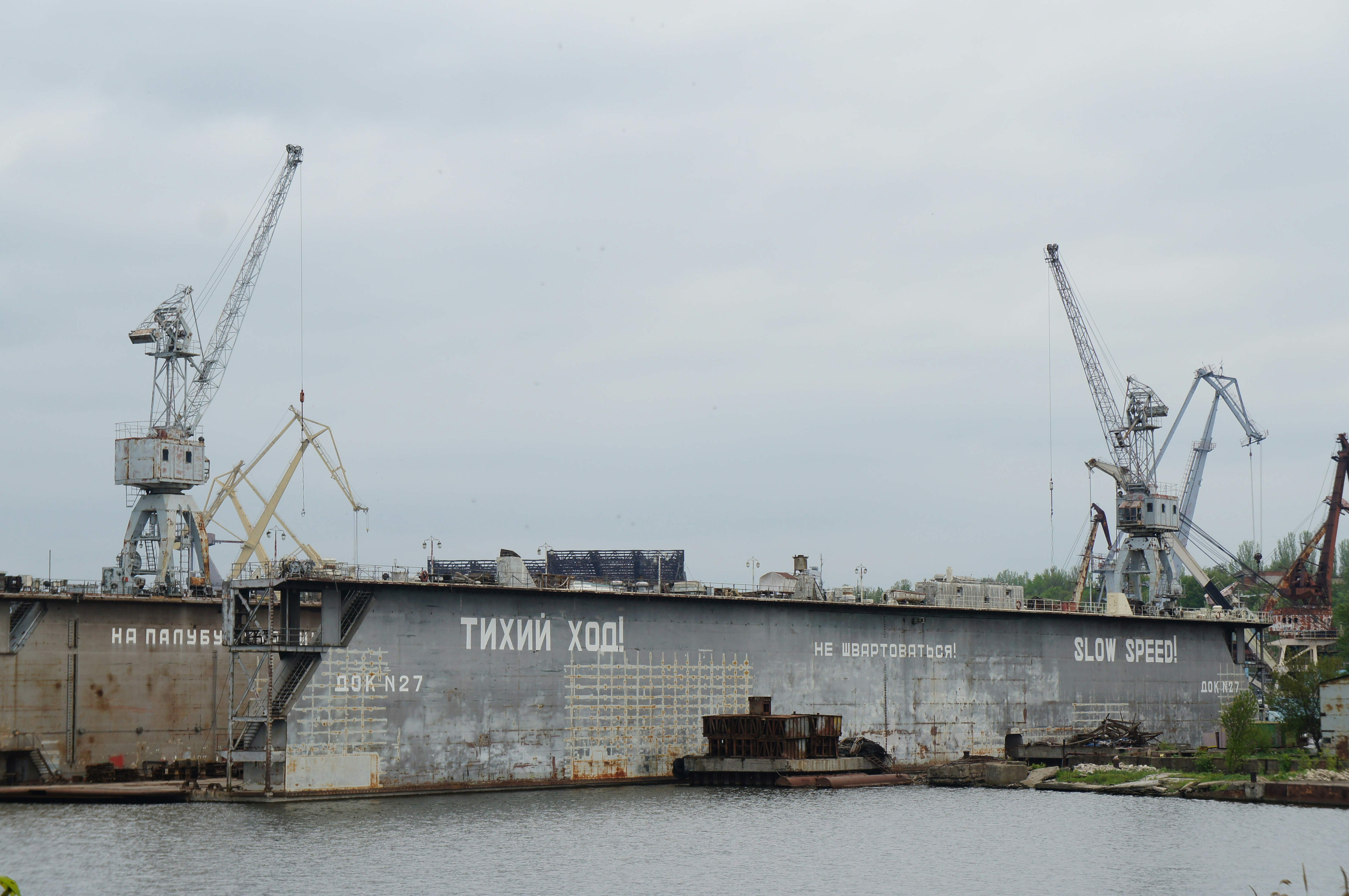 a large ship sitting in the middle of a body of water