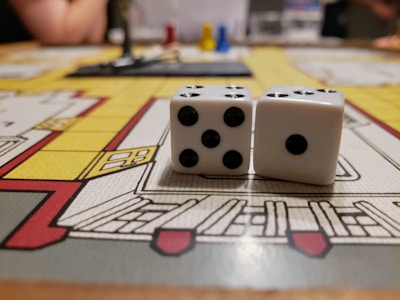 A lively screenshot showing players engaged in an intense round of Ludo Bounty with colorful dice and tokens.