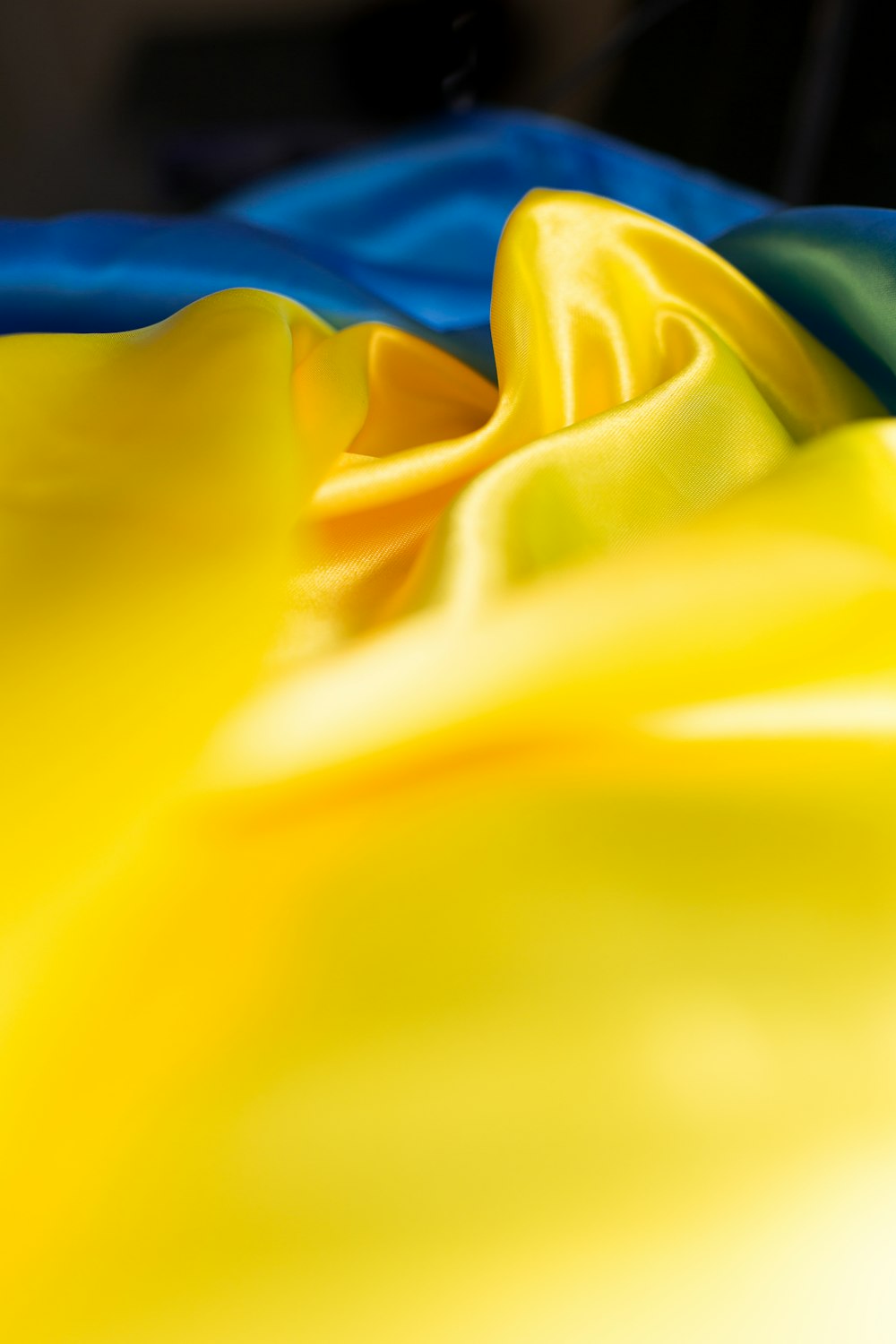 a close up of a yellow and blue cloth