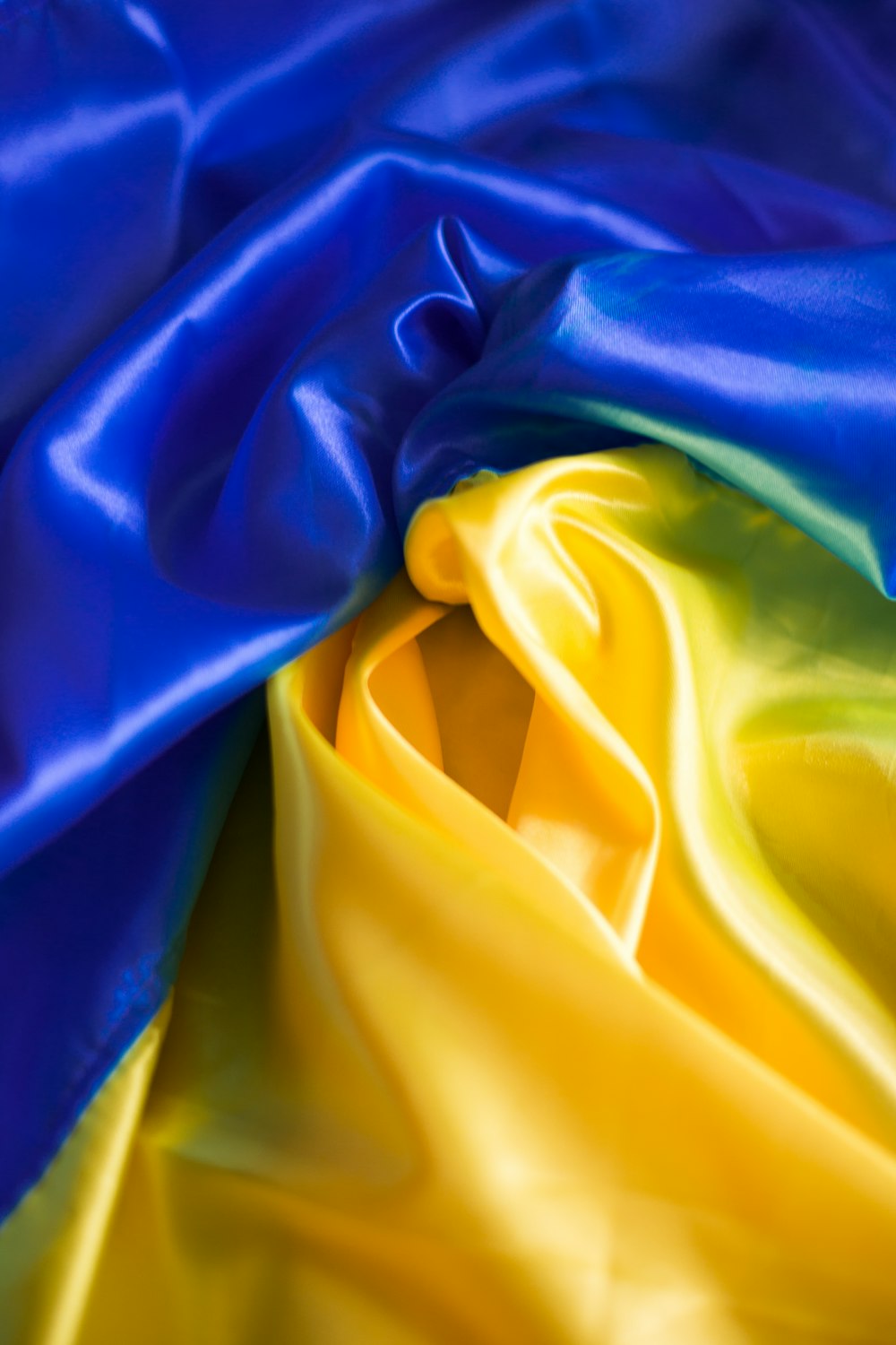 a blue and yellow fabric with a white background
