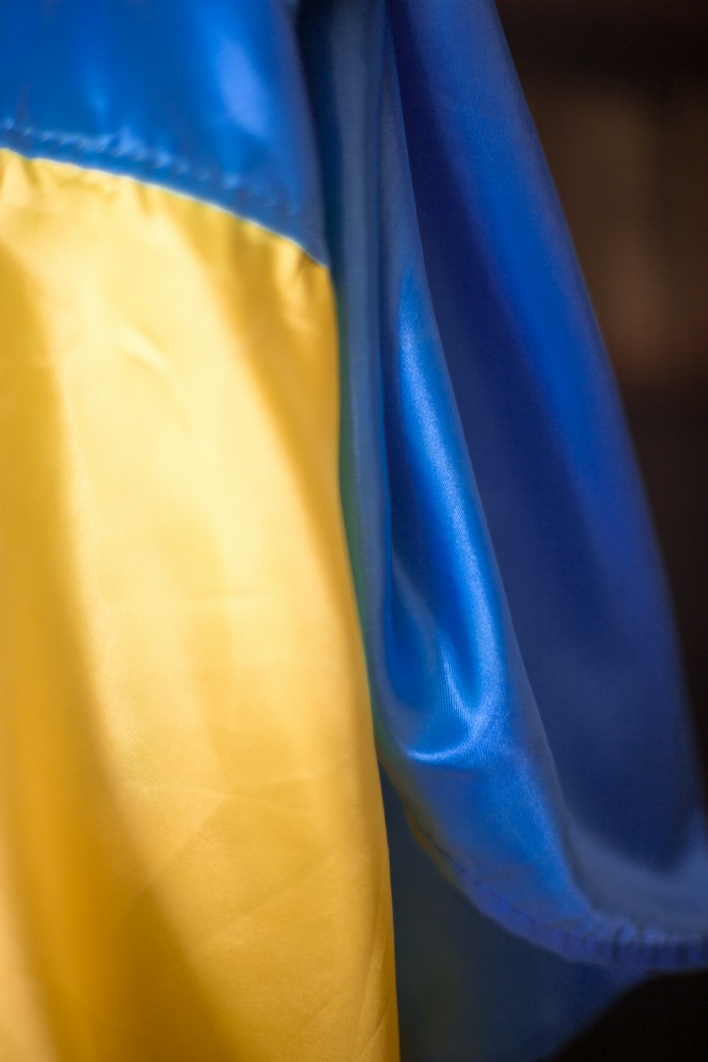 a close up of a yellow and blue dress