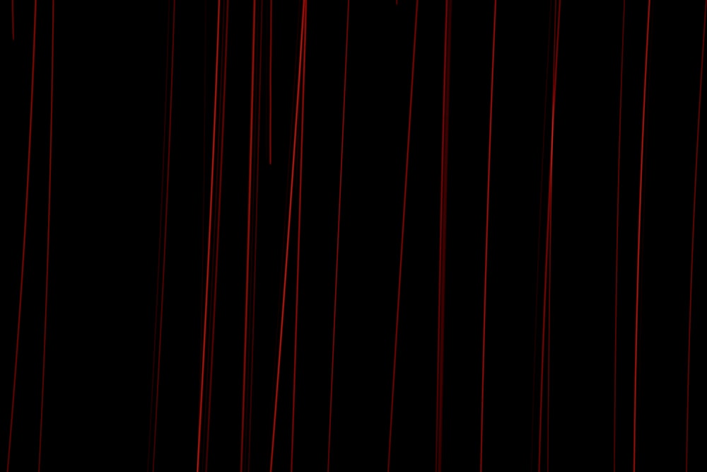 a red curtain with a black background