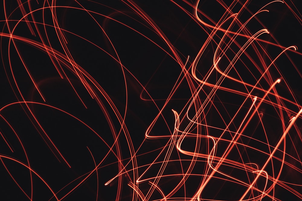 a black background with red lines in it