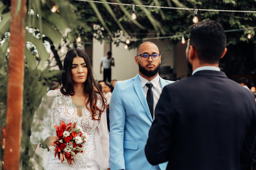 a man and a woman standing next to each other