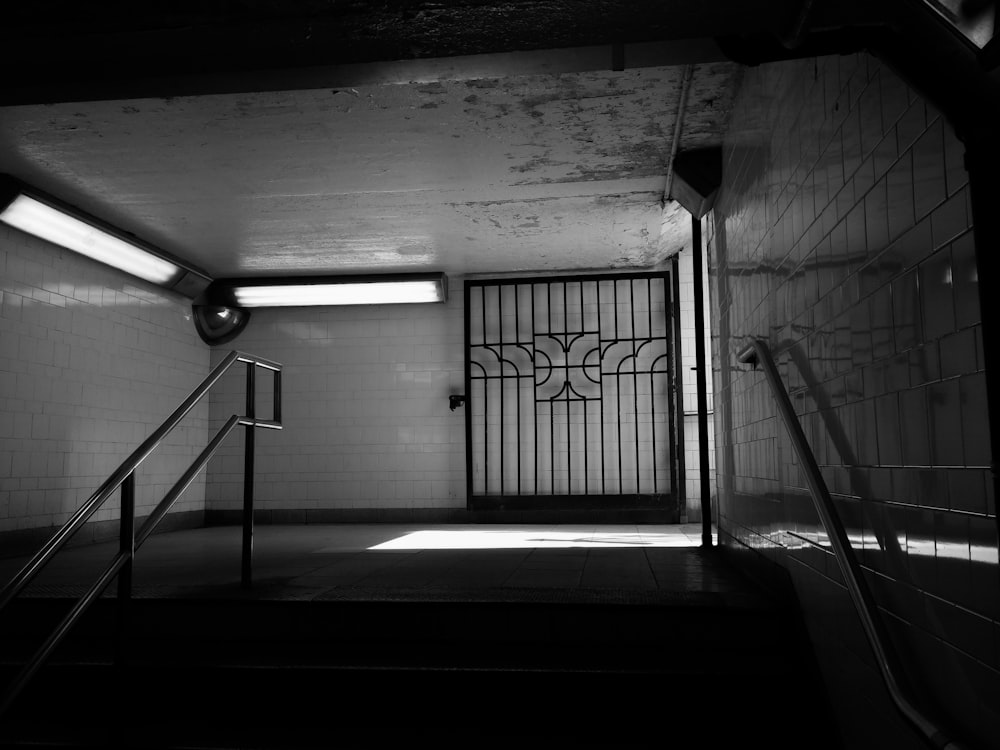 a black and white photo of a stairwell