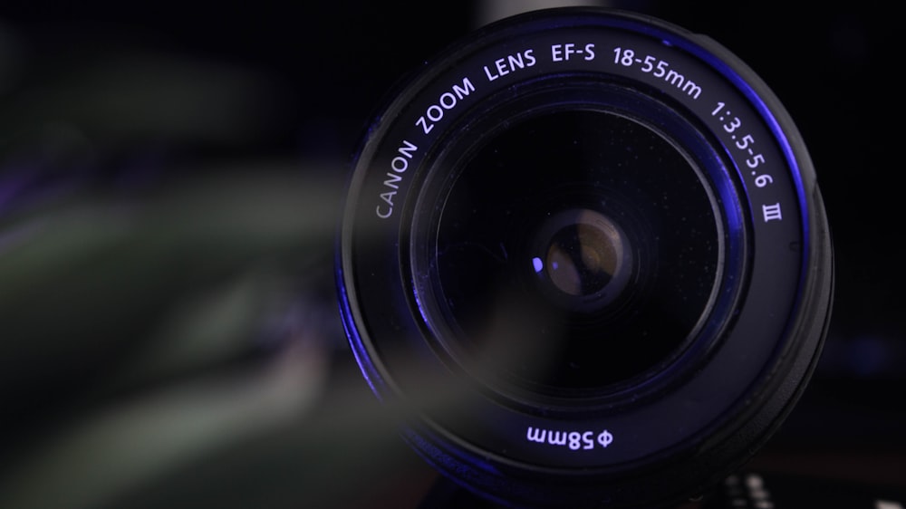 a close up of a camera lens with a blurry background