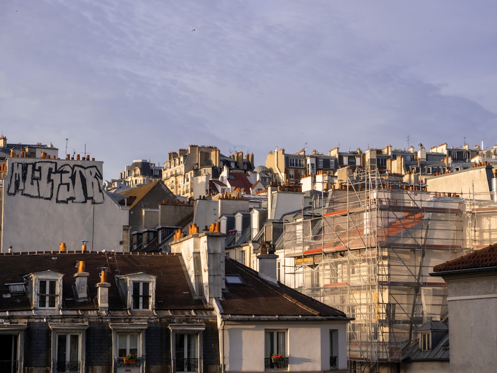 a group of buildings with scaffolding on top of them