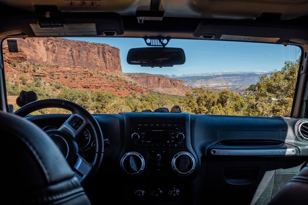a view of the mountains from inside a vehicle