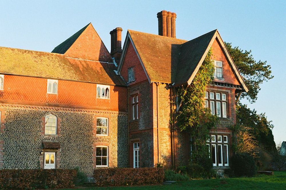 a large brick building with a clock tower