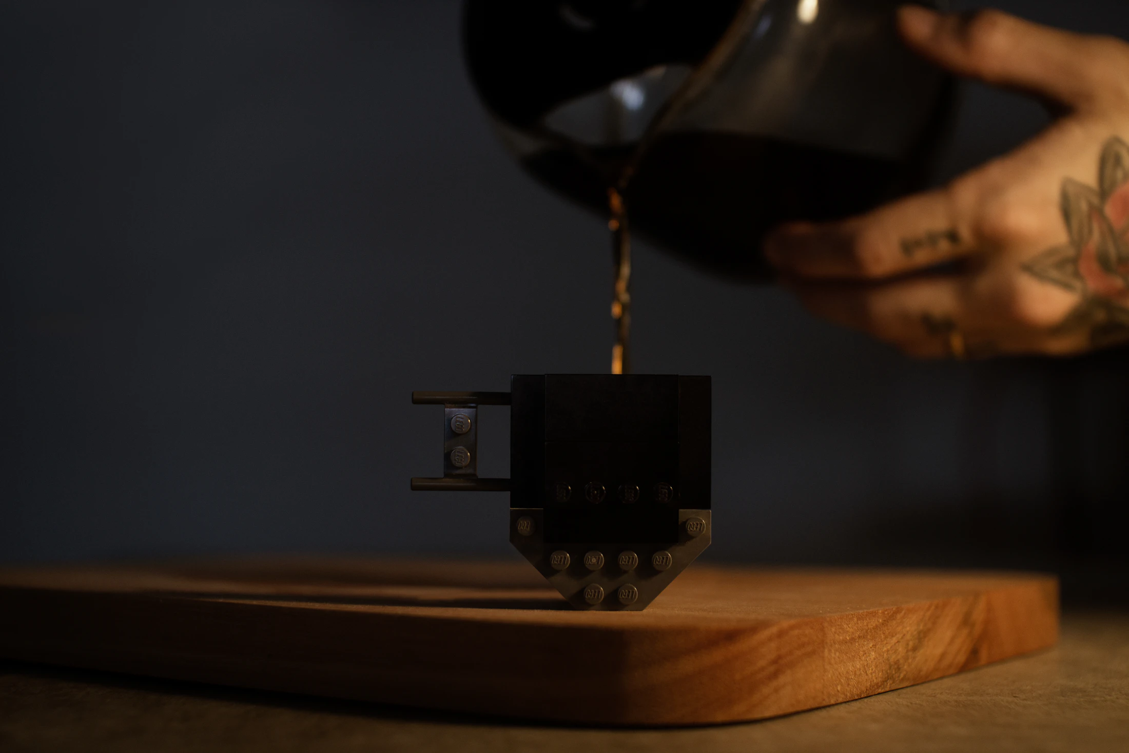 Black cold brew in a glass, hard light