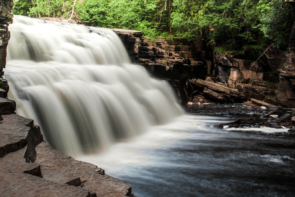 a large waterfall with lots of water coming out of it