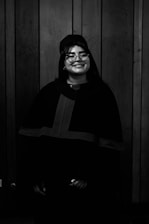 A confident student smiling after an interview session