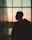 a person standing in front of a window