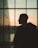 a person standing in front of a window