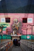 Ram Janki Setu bridge in Rishikesh spanning the Ganges River with the Himalayas in the background