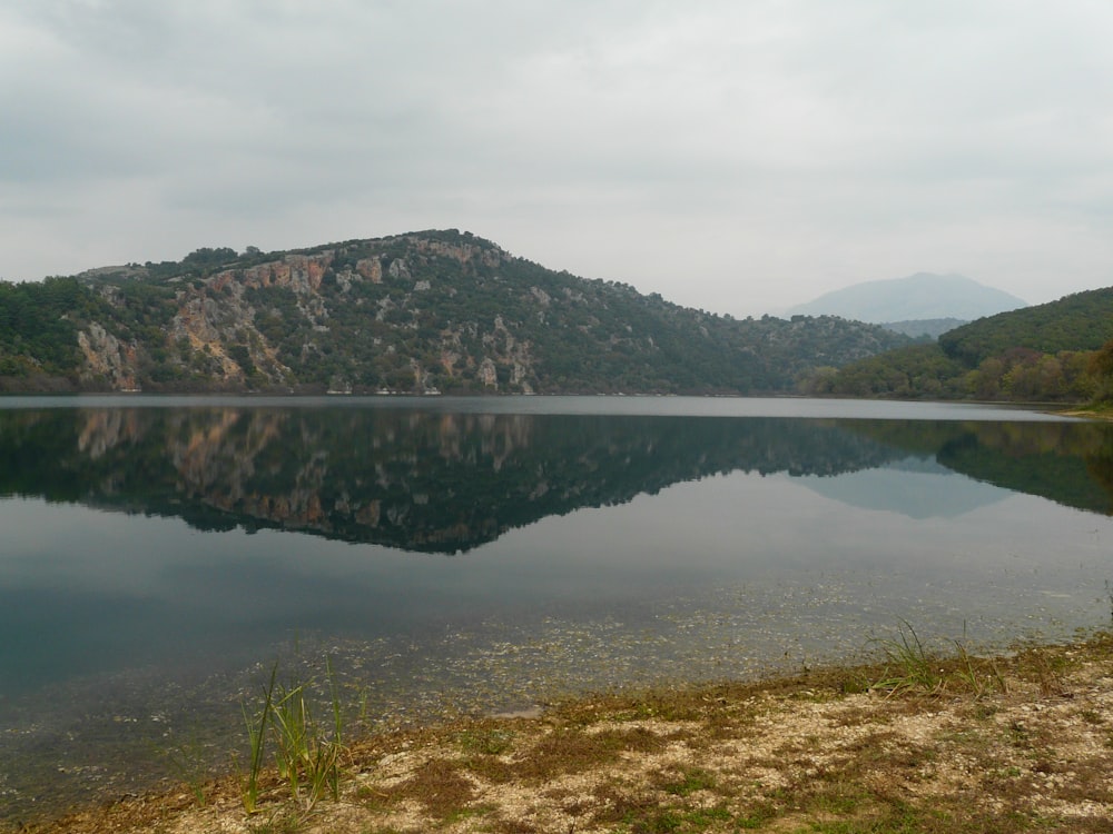 a large body of water surrounded by mountains