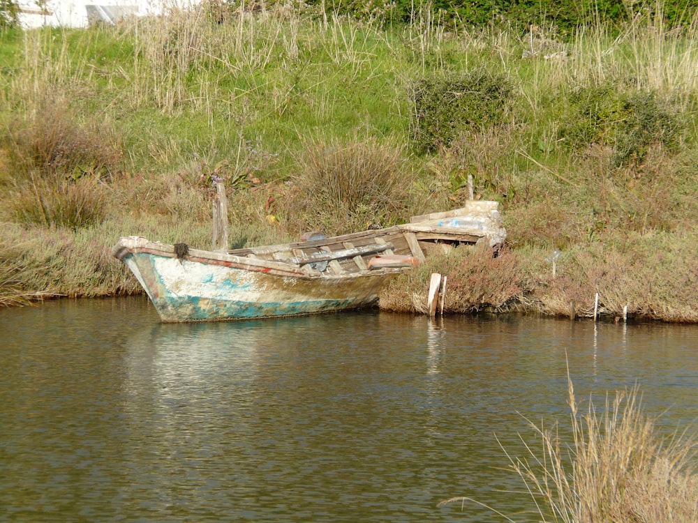 a boat sitting on top of a body of water