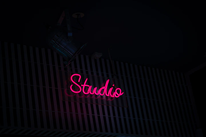 Neon sign reading studio